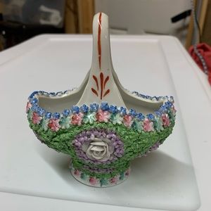 Elfinware basket
with lush green moss and vibrant pink, purple and blue flowers